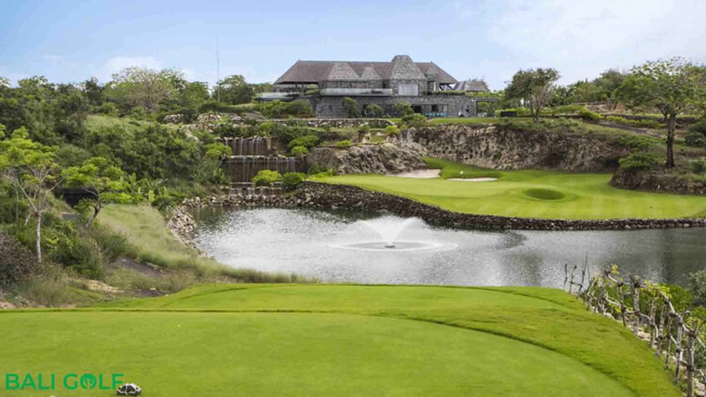 Aerial view of New Kuta Golf above Dreamland Beach with turquoise ocean waves